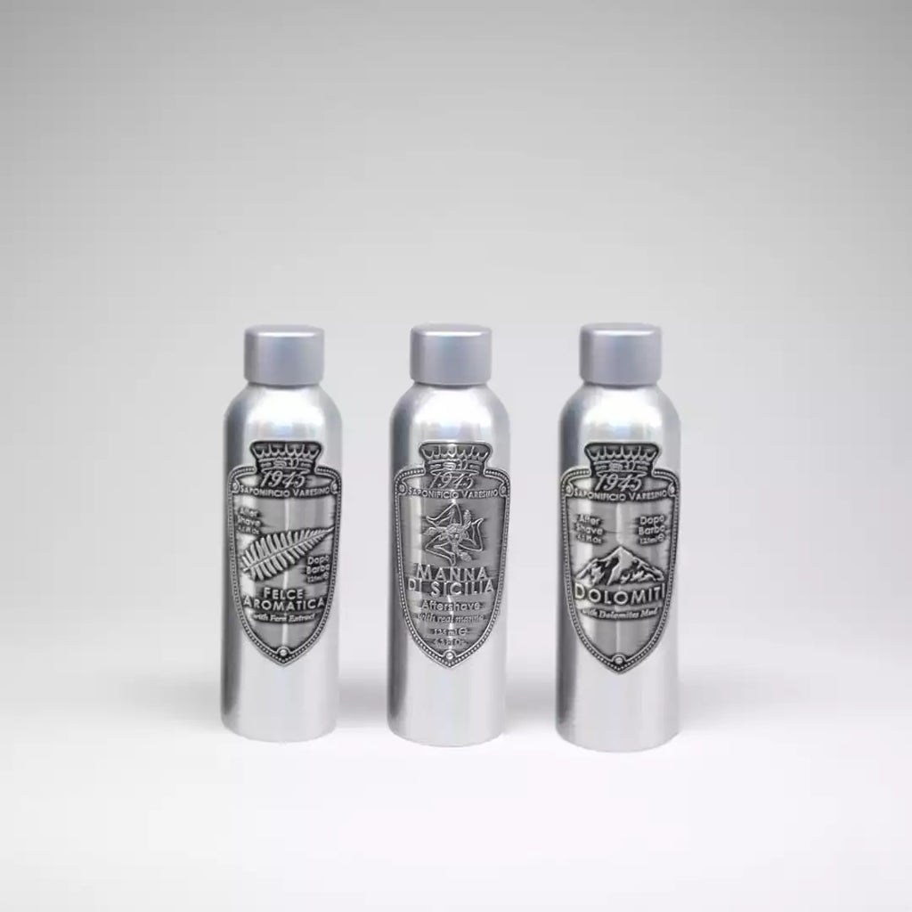 Trio Saponificio Varesino : flacons de lotion après-rasage Felce Aromatica, Manna di Sicilia et Dolomiti. L'excellence de la parfumerie italienne pour le rituel de rasage traditionnel.