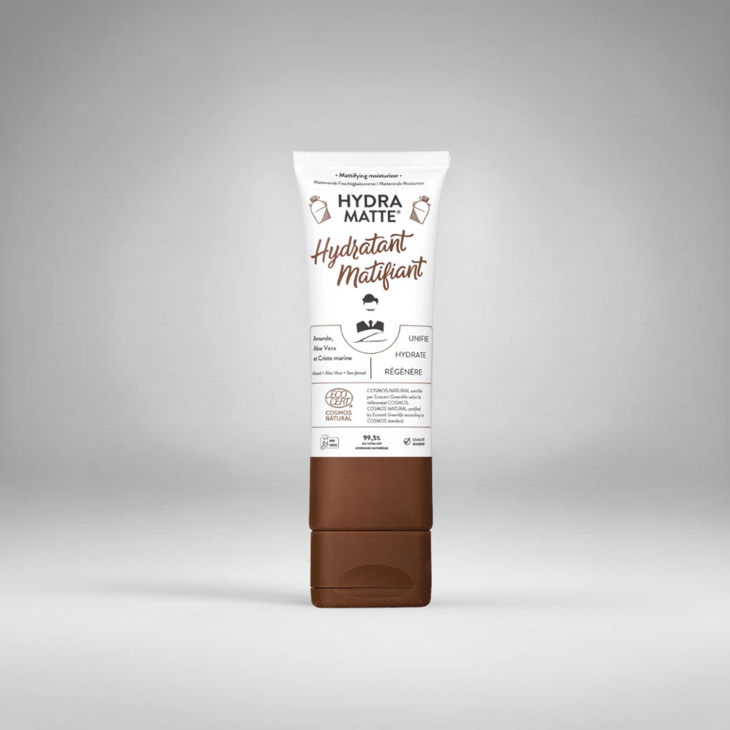 Tube de 75ml de l'hydratant matifiant "Hydra Matte" Monsieur Barbier. Sa formule à base d'amande douce, d'aloe vera et de criste marine est composée à 99,5% d'ingrédients d'origine naturelle.