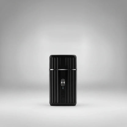 Rasoir électrique professionnel JRL Onyx au design noir mat. Un outil de finition haute performance alliant élégance et ergonomie pour un rasage de près impeccable.